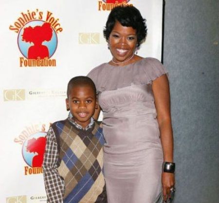 Malinda Williams along with her son, Omikaye Phifer, at an event
